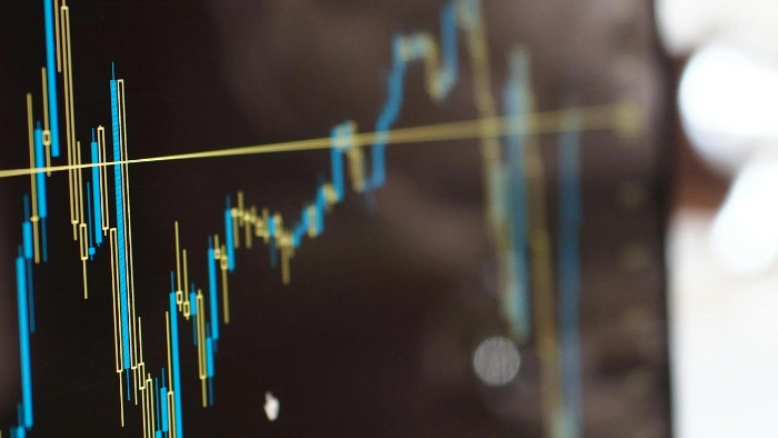 computer screen with market trends graph on it